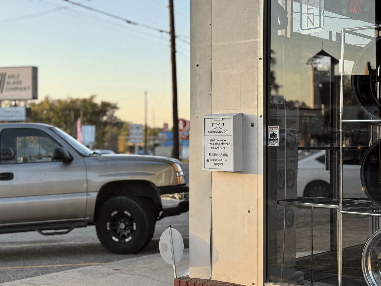 Glasses Drop Off box mounted beside the glass entrance door